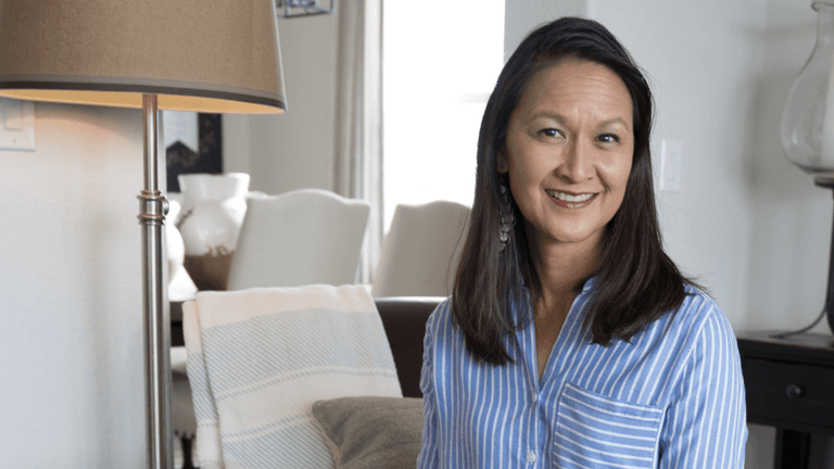 May Bugenhagen, founder of Two Asian Matchmakers, offering a personalized matchmaking experience.