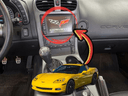 C6 Corvette factory dashboard with Bluetooth adapter installation location highlighted.