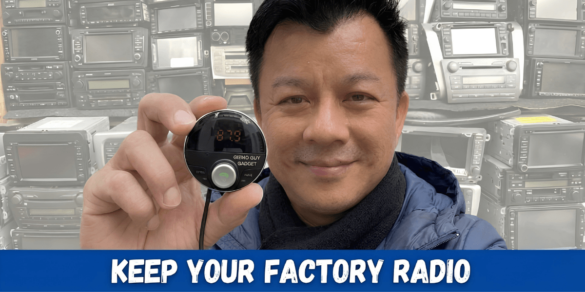 Person holding a gadget for factory radio conversion with vintage radios in background