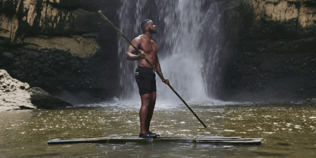Chaz Ferguson embracing nature, symbolizing strength and resilience.