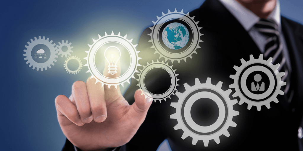 Businessman interacting with gears representing ideas, technology, and collaboration concepts