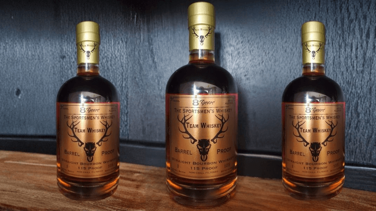 "Team Whiskey 8-year 115 Barrel Proof Bourbon – Craftsmanship, adventure, and outdoor lifestyle in every bottle."