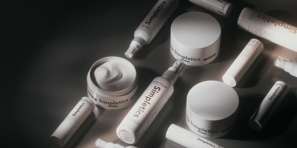 Simpletics hair care products arranged aesthetically, highlighting minimalist packaging and natural ingredient branding.