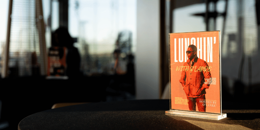 Promotional display for Lunchin’ with O’Lanre, a talk series blending culture, entrepreneurship, and community discussions hosted by O'Lanre.