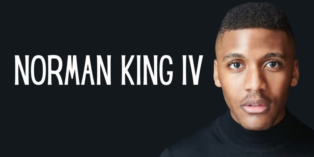 Norman King IV, an international filmmaker, smiling confidently, representing his global storytelling and dedication to impactful narratives.